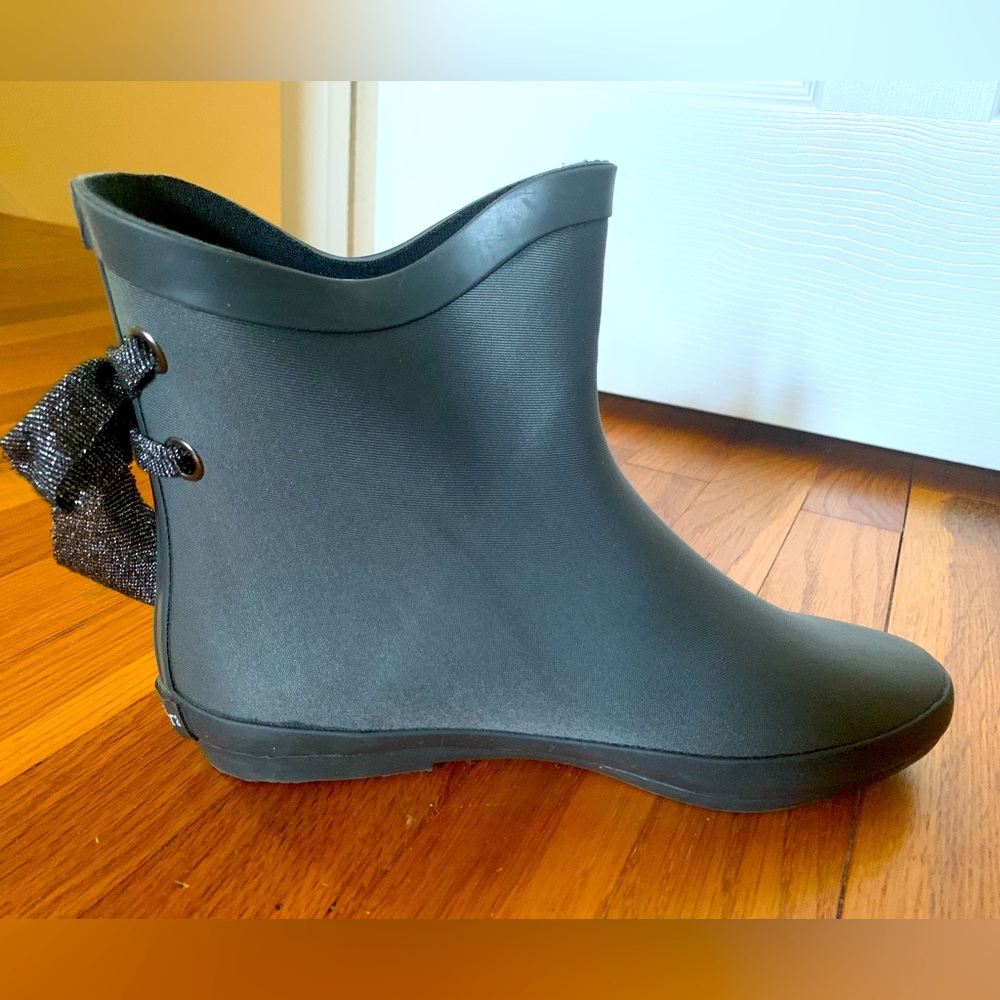 Henry Ferrara never-worn rubber rain boots with ribbon ties at the ankle.